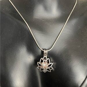 Pearl lotus locket silver tone necklace